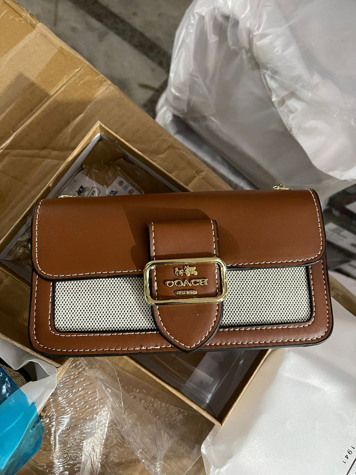 Buy First Copy Coach Morgan Sleek And Trendy Sling Bag