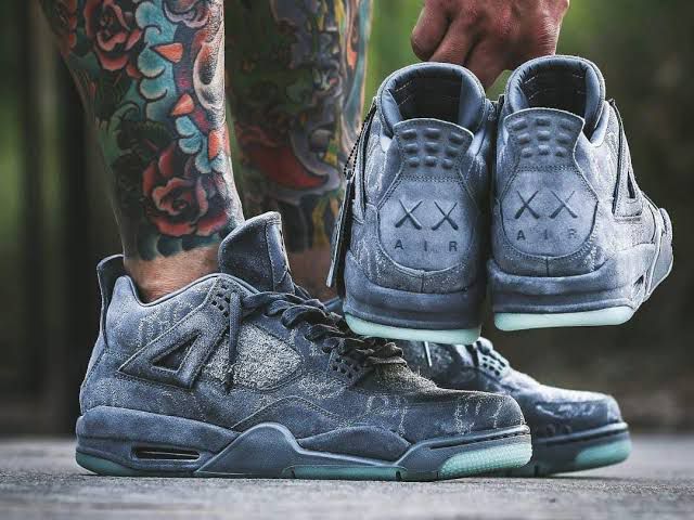Buy First Copy Air Jordan 4 Retro x KAWS - Master Quality 7A Mirror at Lowest Price Online India