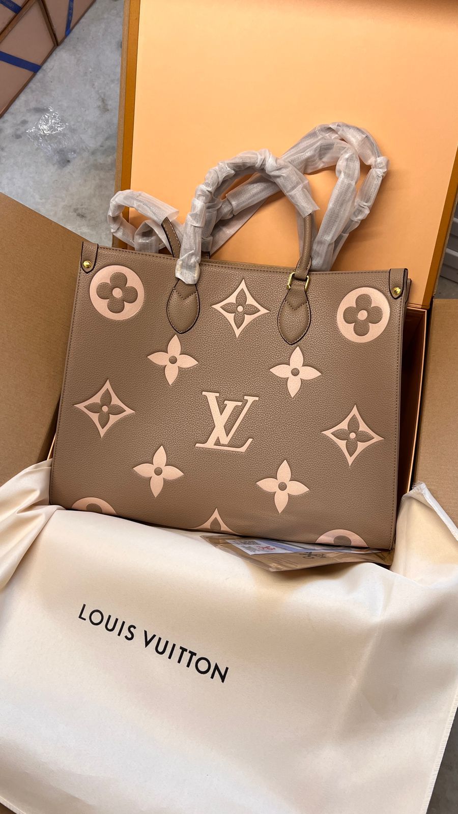 Buy First Copy Louis Vuitton OnTheGo MM Empreinte Leather Tote Bag - Master Quality 7A Mirror at Lowest Price Online India
