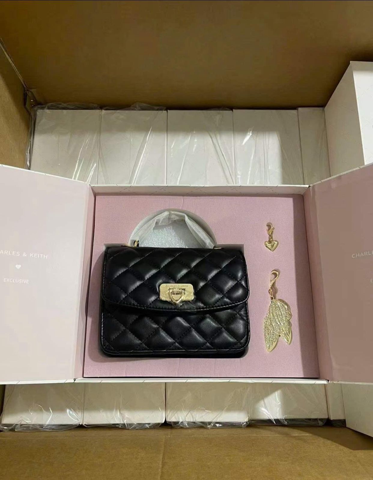 Buy First Copy Charles & Keith Cressida Quilted QIKI 2025 Women Sling Bags - Master Quality 7A Mirror at Lowest Price Online India