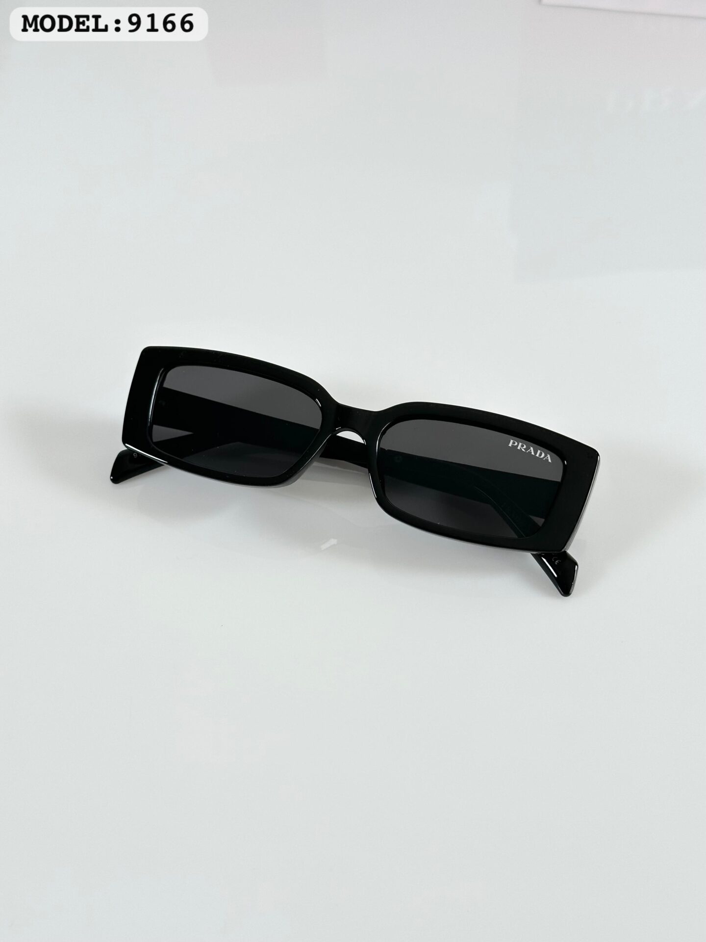 Buy First Copy Prada rectangular Unisex Sunglasses – side view showing authentic design. Cash on Delivery available, Free shipping across India, Pan India delivery, UV400 protection lenses
