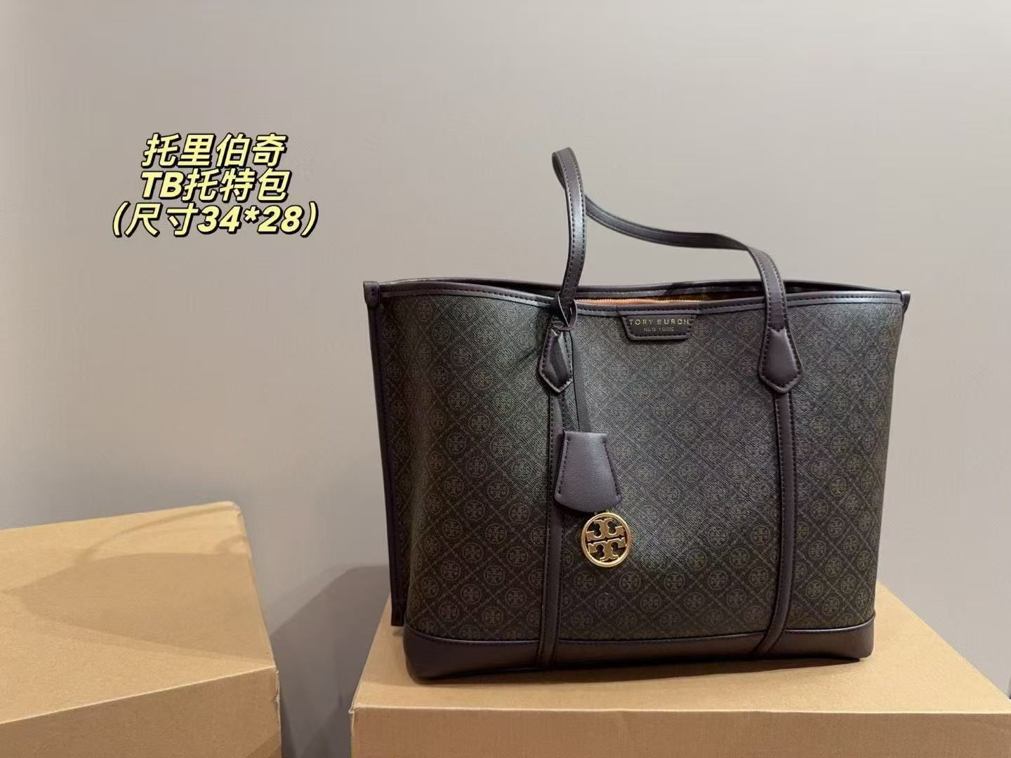 Buy First Copy Tory Burch Jacquard Women's Tote Bag – premium 1:1 master replica with original box packaging. Cash on Delivery available, Free shipping across India, Pan India delivery, Premium synthetic leather