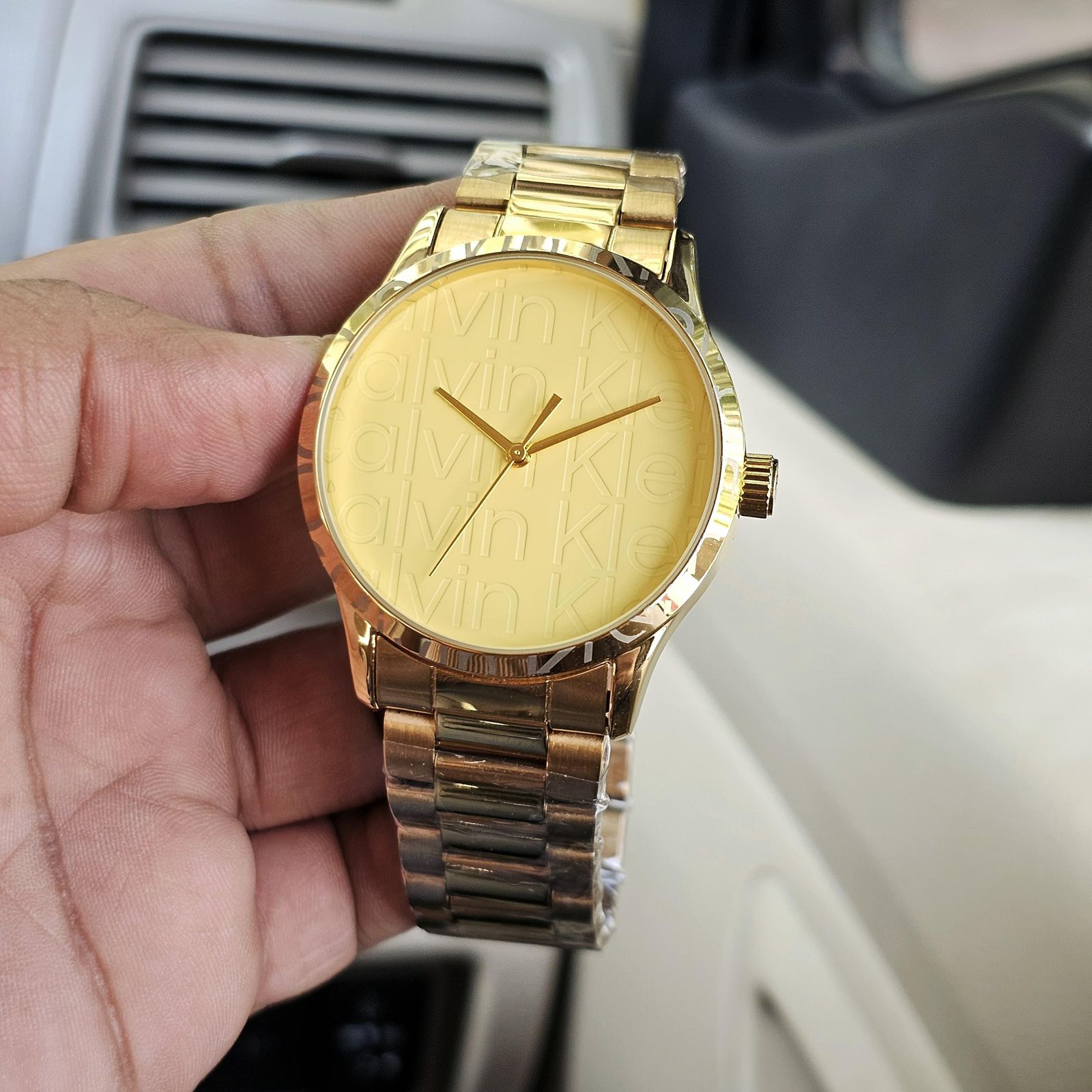 Buy First Copy Calvin Klein Minimal Stainless Steel 38mm Quartz Machine Ladies Watch – side view showing authentic design. Cash on Delivery available, Free shipping across India, Pan India delivery, Premium stainless steel build
