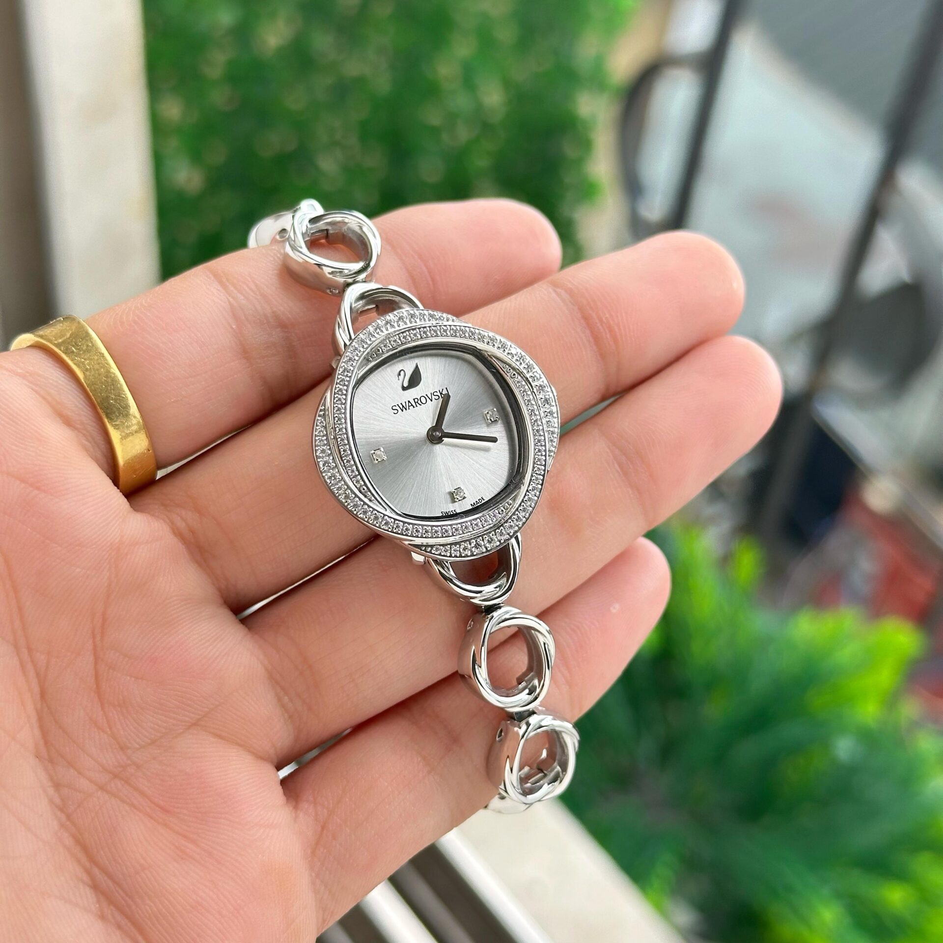 Buy First Copy Elegant Swarovski Stainless Steel Silver 35mm Swiss Quartz Movement Women's Watch – close-up showing authentic design. Cash on Delivery available, Free shipping across India, Pan India delivery, Premium stainless steel build