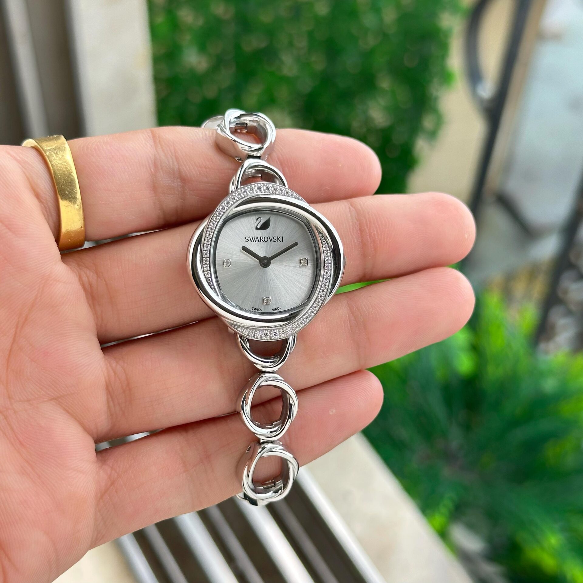 Buy First Copy Elegant Swarovski Stainless Steel Silver 35mm Swiss Quartz Movement Women's Watch – premium 1:1 master replica with original box packaging. Cash on Delivery available, Free shipping across India, Pan India delivery, Premium stainless steel build