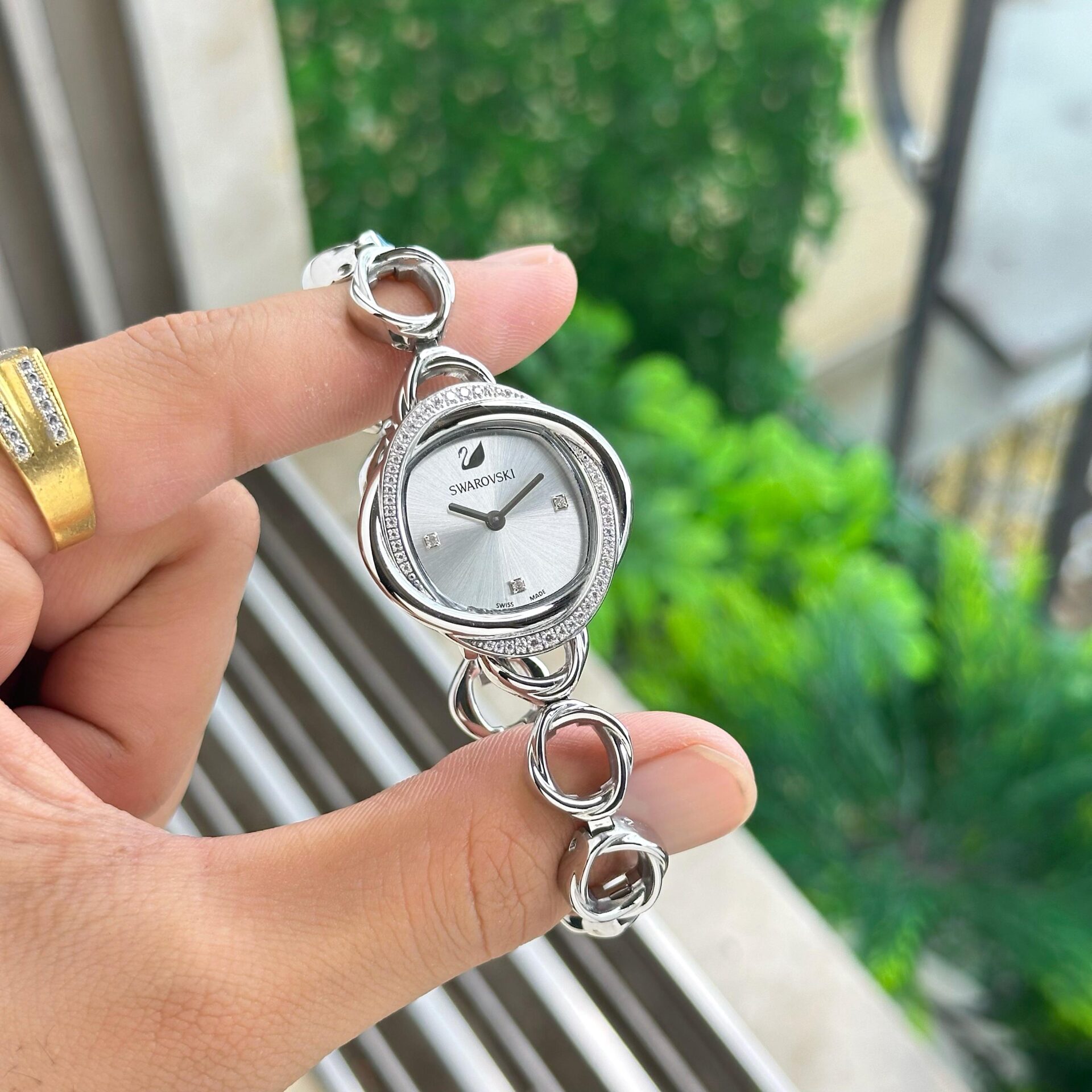 Buy First Copy Elegant Swarovski Stainless Steel Silver 35mm Swiss Quartz Movement Women's Watch – side view showing authentic design. Cash on Delivery available, Free shipping across India, Pan India delivery, Premium stainless steel build