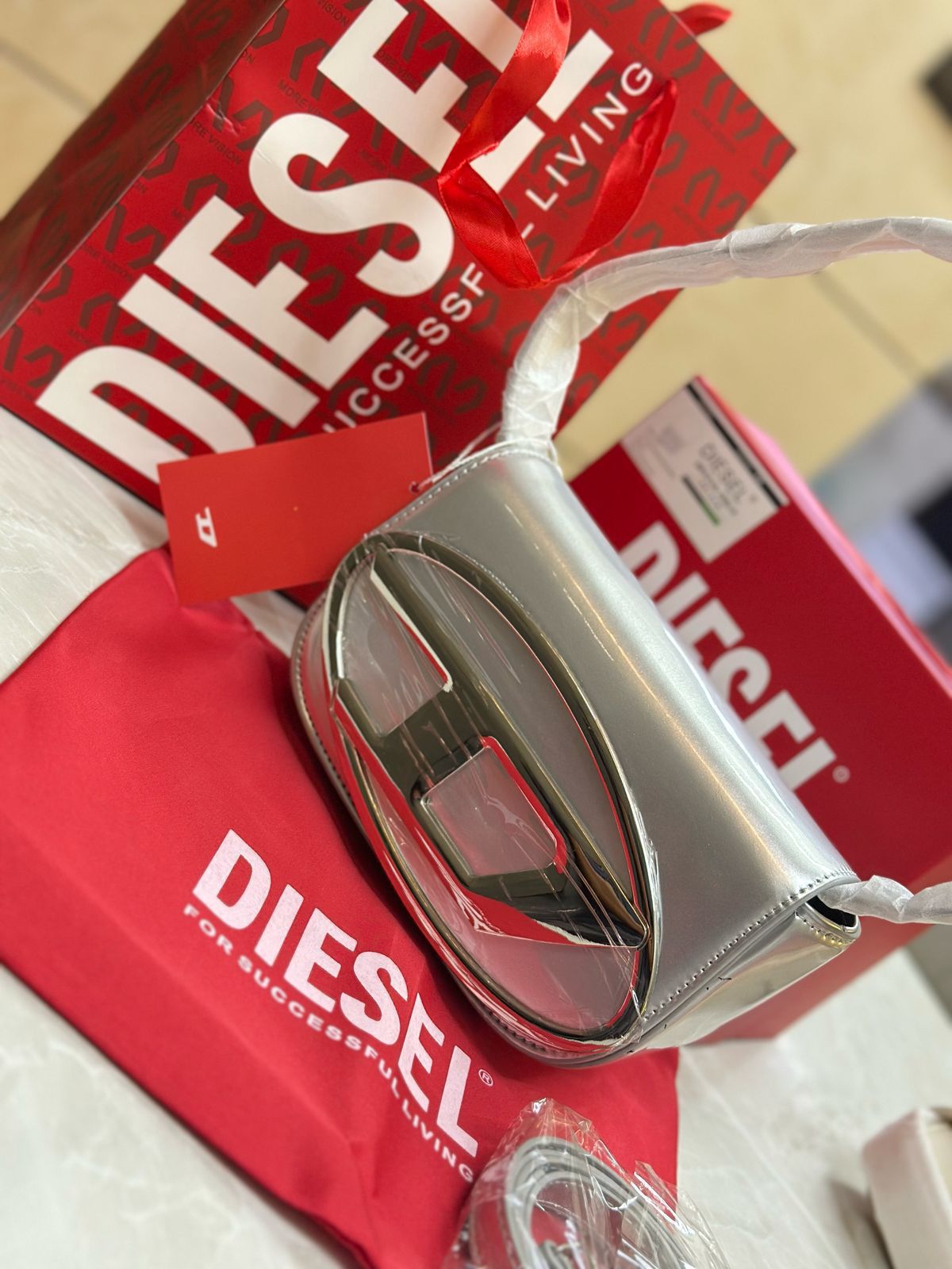 Buy First Copy Diesel 1DR Iconic Oval D Logo Leather Shoulder Bag - Master Quality 7A Mirror at Lowest Price Online India