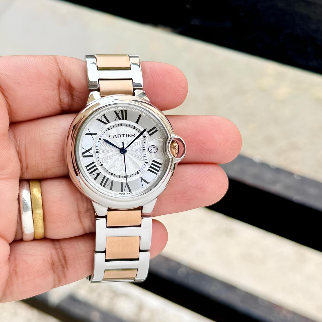 Buy First Copy Cartier Ballon Bleu Two-Tone Stainless Steel Roman Dial 33mm Quartz Movement Women's watch – premium 1:1 master replica with original box packaging. Cash on Delivery available, Free shipping across India, Pan India delivery, Premium stainless steel build